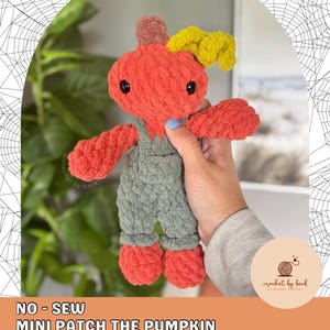 May include: A plush crochet pumpkin doll with a round orange head, black safety eyes, a brown stem, and curly yellow vines. The doll wears olive green overalls and has orange feet. Text reads: NO-SEW MINI PATCH THE PUMPKIN DIGITAL DOWNLOAD CROCHET PATTERN.