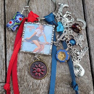 Cowgirl Up vintage pin up, soldered two sided focal, phrase on back, Leather, Czech and African glass, Silver tone charms, Key/Purse Charm