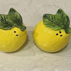 Bright yellow lemon shaped Ceramic Salt and pepper shakers, match them with other lemon kitchen accessories in my shop, whimsical gifts!