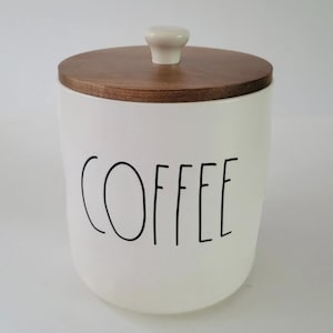Rare, Rae dunn, ceramic Coffee Canister has a wooden tight seal lid for coffee storage, functional, beautiful! Great Gift for any occasion!