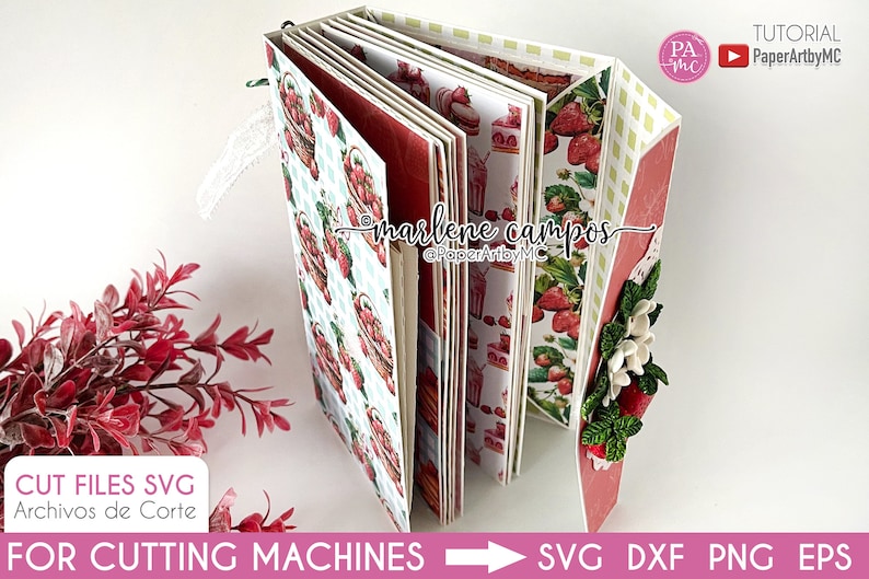 May include: A handmade paper craft album with a strawberry theme. The album features pages with strawberry basket and dessert patterns. The cover is decorated with white flowers and red berries. The album is designed for cutting machines.