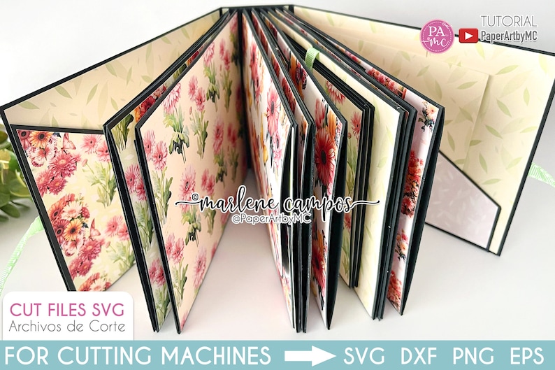 May include: A floral patterned scrapbook with black trim and a green ribbon. The scrapbook is open to reveal multiple pages with floral patterns. The text "CUT FILES SVG" and "Archivos de Corte" is visible on the front cover. The text "FOR CUTTING MACHINES" is visible on the bottom left corner of the image. The text "SVG DXF PNG EPS" is visible on the bottom right corner of the image. The text "marlene campos @PaperArtbyMC" is visible on the inside of the scrapbook.