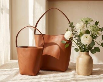 Bolso cubo minimalista de piel sintética para mujer: bolso de hombro para uso diario, bolso de trabajo moderno.