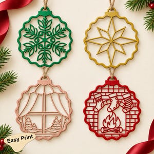 May include: Four circular hanging ornaments with scalloped edges. One is green with a snowflake design, one is gold with a star, one is rose gold with a window view of trees, and one is red with a fireplace, stockings, and fire graphic.