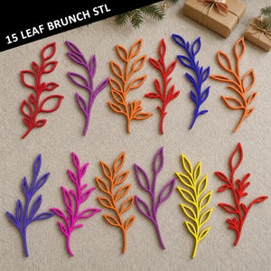 May include: A collection of colorful, leaf-shaped decorative items in various shades of red, purple, orange, blue, and yellow. The text "15 LEAF BRUNCH STL" is visible at the top. The leaves are arranged on a neutral surface.