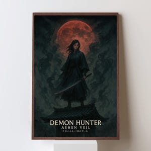 May include: A framed art print featuring a dark-haired figure in black attire, holding a sword, standing on a structure. The background includes a large red moon and shadowy figures. The text "DEMON HUNTER ASHEN VEIL" is displayed at the bottom.