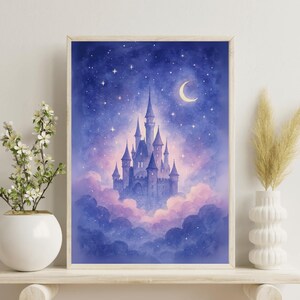 May include: A watercolour painting of a fairytale castle with tall spires, set against a starry night sky with a crescent moon. The castle floats above fluffy, purple-tinged clouds. The artwork is framed in a light wood frame.