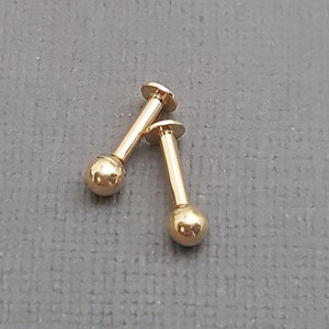 14k gold labret piercing. Internally threaded labret. 16 gauge labret.