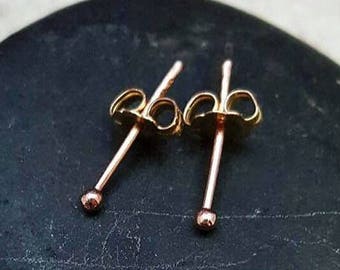 14K Solid Gold Tiny Dot Ball Stud Earrings. 2 mm 14k rose gold ball studs. Second hole studs. Teeny tiny ball stud earrings. 21 gauge.