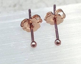 14K Solid Gold Tiny Dot Ball Stud Earrings. 2 mm 14k rose gold ball studs. Second hole studs. Teeny tiny ball stud earrings. 21 gauge.