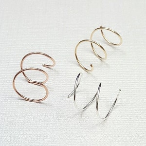 Double piercing earrings. Two hole spirals. Spiral earrings. threader earrings. Double spiral. Double hole earrings. Twist in hoops.