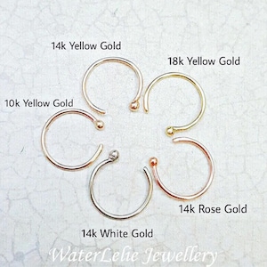 May include: Six nose rings in different gold colours: 10k yellow gold, 14k yellow gold, 18k yellow gold, 14k white gold, and 14k rose gold.