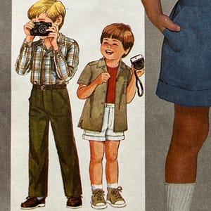May include: Vintage Simplicity sewing pattern for a child's outfit, featuring a boy in a patterned shirt and blue shorts. The pattern includes illustrations and the number 6475. The price is $3.50.