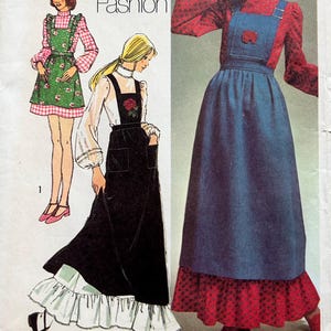 May include: Simplicity sewing pattern 9712 featuring illustrations of young contemporary fashion designs. The pattern includes a dress with a ruffled hem, a denim jumper, and a floral print dress. The pattern is marked with the price of $1.00.