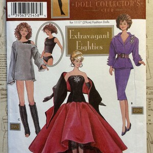 May include: A Simplicity sewing pattern envelope for 11.5-inch fashion dolls titled Extravagant Eighties. The cover features illustrations of three doll outfits: a gray sweater dress, a black and red strapless gown, and a purple skirt suit.