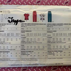 May include: A Simplicity sewing pattern envelope, number 4644, with illustrations of a top and trousers. The envelope includes size charts, fabric requirements, and finished garment measurements in cm.
