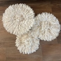 White Feather Juju Hat Set of 3: Handmade Boho Wall Decor product logo
