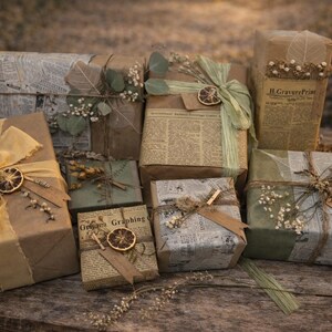 May include: An assortment of wrapped gifts on a wooden surface. The gifts are wrapped in brown paper, newspaper, and olive green paper, adorned with dried flowers, ribbons, and dried orange slices. Some gifts have tags.