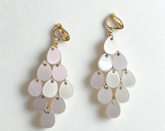 Eleganti clip-on con schelpdesign / Oorbellen zonder gaatjes / Dames clip-on oorbellen