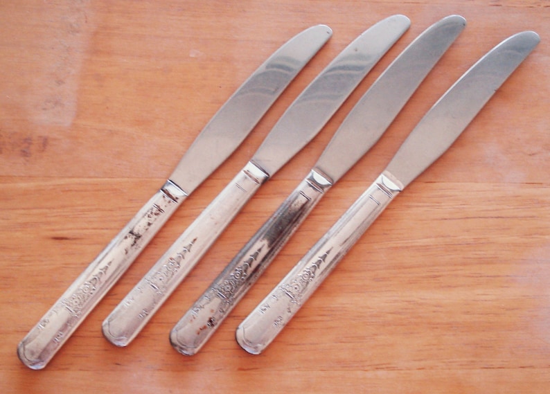 Vintage Simeon L And George H Rogers Company. Stainless Steel With Silver Plated Handle Dinner Knives. image 1