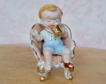 Vintage Baby Boy in Chair Ceramic Figurine and Drinking From a Cup Made in Japan with Golden Accents