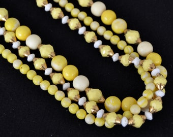 Vintage Triple-Stranded Necklace with Yellow Plastic Beads and Metal Flower Clasp