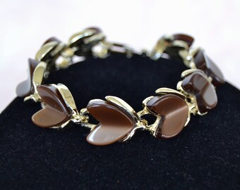 Vintage Bracelet in Gold Tone Metal with Brown Thermoset Leaves