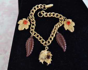 Vintage Charm Bracelet Made of Gold Tone Metal with Metal Rhinestone Leaves and Brown Plastic Leaves