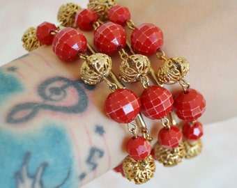 Vintage Bracelet with Red Plastic and Gold Tone Metal Beads