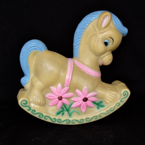 vintage plastic rocking horse