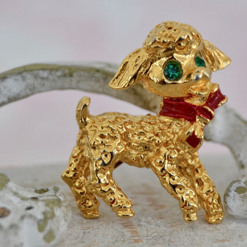 Vintage Lamb Brooch in Gold Tone Metal with Green Rhinestone Eyes