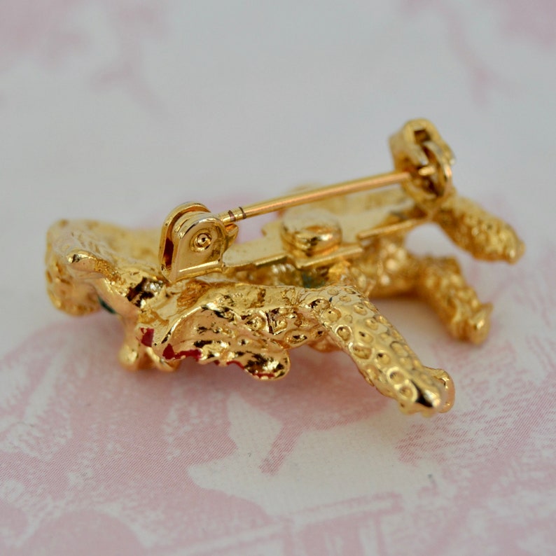 Vintage Lamb Brooch in Gold Tone Metal with Green Rhinestone Eyes