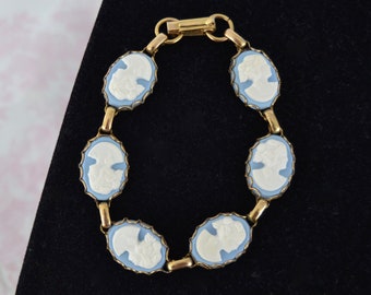 Vintage Cameo Bracelet Made of Gold Tone Metal and Light Blue Plastic Portrait Cameos