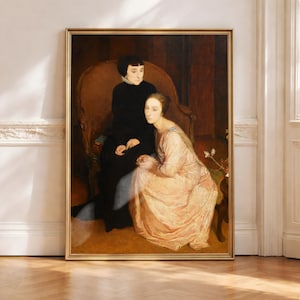 May include: A framed portrait featuring two women. One woman is seated in a high-backed chair, wearing a black dress. The other woman is seated beside her, wearing a pink dress. The artwork has a warm color palette and is displayed in a gold frame.