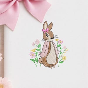 May include: A set of three ceramic mugs with a speckled, matte finish. The mugs are in shades of cream, light gray, and dark gray. Each mug has a simple, minimalist design, perfect for coffee or tea.