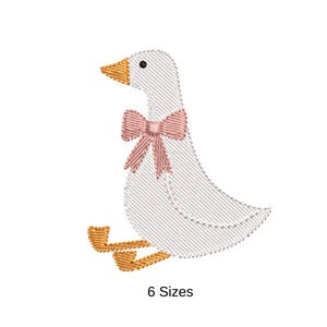May include: An embroidered design of a white goose with a pink bow tie and yellow beak and feet. The text "6 Sizes" is below the goose.