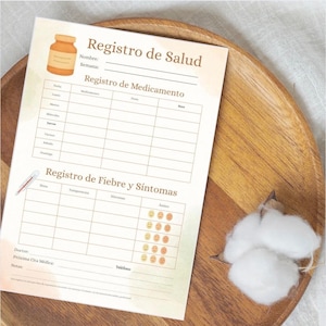 Pode incluir: Uma folha de registo de saúde impressa com o título "Registro de Salud" em espanhol. A folha inclui secções para medicamentos e febre/sintomas, com espaços para registar detalhes. Um termómetro e um frasco de medicamento são ilustrados.