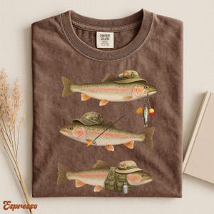 Espresso brown Comfort Colors® t-shirt displayed flat, design features three trout in fisherman costume with lures, vest, and rod.