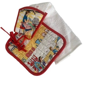 May include: A quilted pot holder and oven mitt set with a red trim and a matching red ribbon. The set features a vintage kitchen scene with a woman baking. A white kitchen towel is also included.