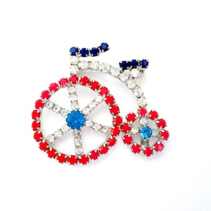 Fiets driewieler broche rood wit blauw glas strass pin jaren 1970 bling