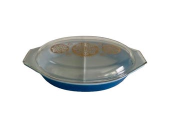 Cazuela Pyrex promocional de MCM con tapa y compartimentos
