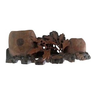 May include: A carved wooden stand with two brown stone pots and a carved leafy design. The stand is made of dark wood and has a rustic look.
