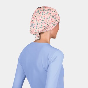 May include: A white ceramic mug with a black handle and the text "But First, Coffee" in a black, handwritten-style font. The mug is on a white surface.