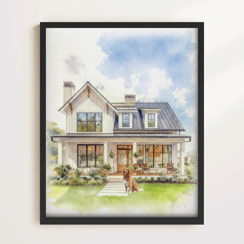May include: Watercolor painting of a white farmhouse with a black roof and a wraparound porch. A golden retriever sits on the green lawn in front of the house. The sky is blue with fluffy white clouds. The artwork is framed in a black frame.