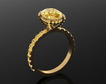 Peut inclure: Une bague en or avec une grosse pierre jaune ovale. La monture est ornée de petites pierres jaunes. La bague est posée sur un fond sombre, soulignant son design complexe et son éclat. Un bijou.