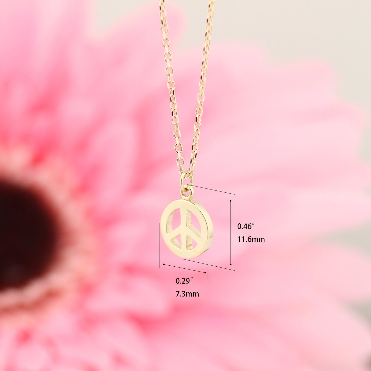 Gold store peace pendant