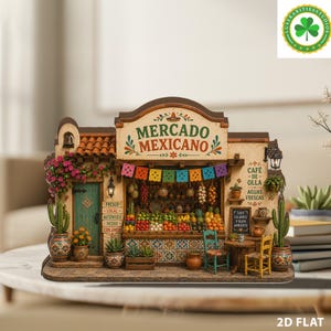May include: A miniature model of a Mexican market stall featuring a green door, colourful papel picado banners, and shelves stocked with various fruits and vegetables. The facade displays the text MERCADO MEXICANO, CAFÉ DE OLLA, and AGUAS FRESCAS.