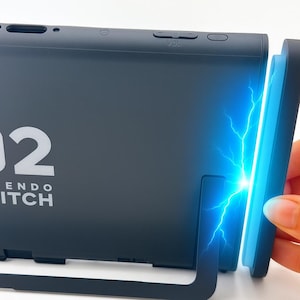 May include: A dark gray Nintendo Switch console with the number "2" and the word "ENDO SWITCH" printed in white. A blue light with lightning bolt effects emanates from the side of the console.
