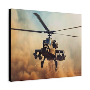 May include: A canvas print depicting a military helicopter in flight. The tan and black helicopter has blurred blades, indicating movement. Dust and debris are visible against a blue sky and tan background.