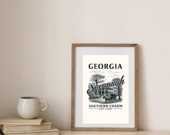 May include: A framed print featuring a vintage-style illustration of Savannah, Georgia. The artwork includes the text "GEORGIA" at the top, "Savannah" in a cursive font, and "SOUTHERN CHARM - EAST COAST" at the bottom. The image is in a wooden frame.